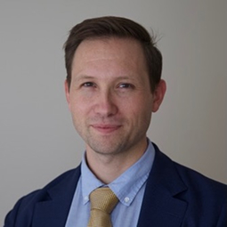 A photograph of a man.